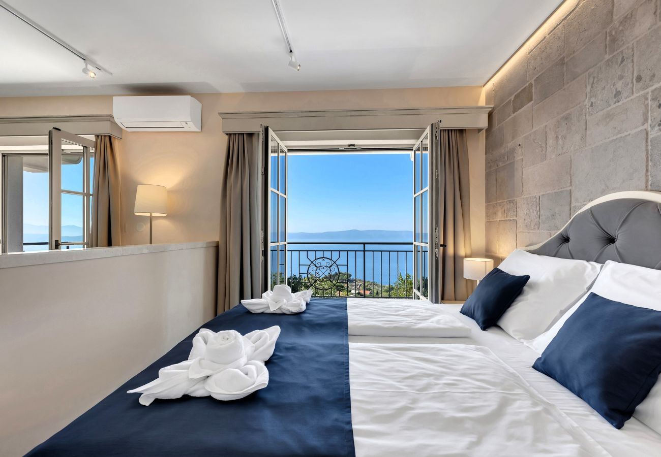 Zimmeranmietung in Podgora - Hotel Nature's Retreat, Deluxe Suite mit Balkon und Meerblick